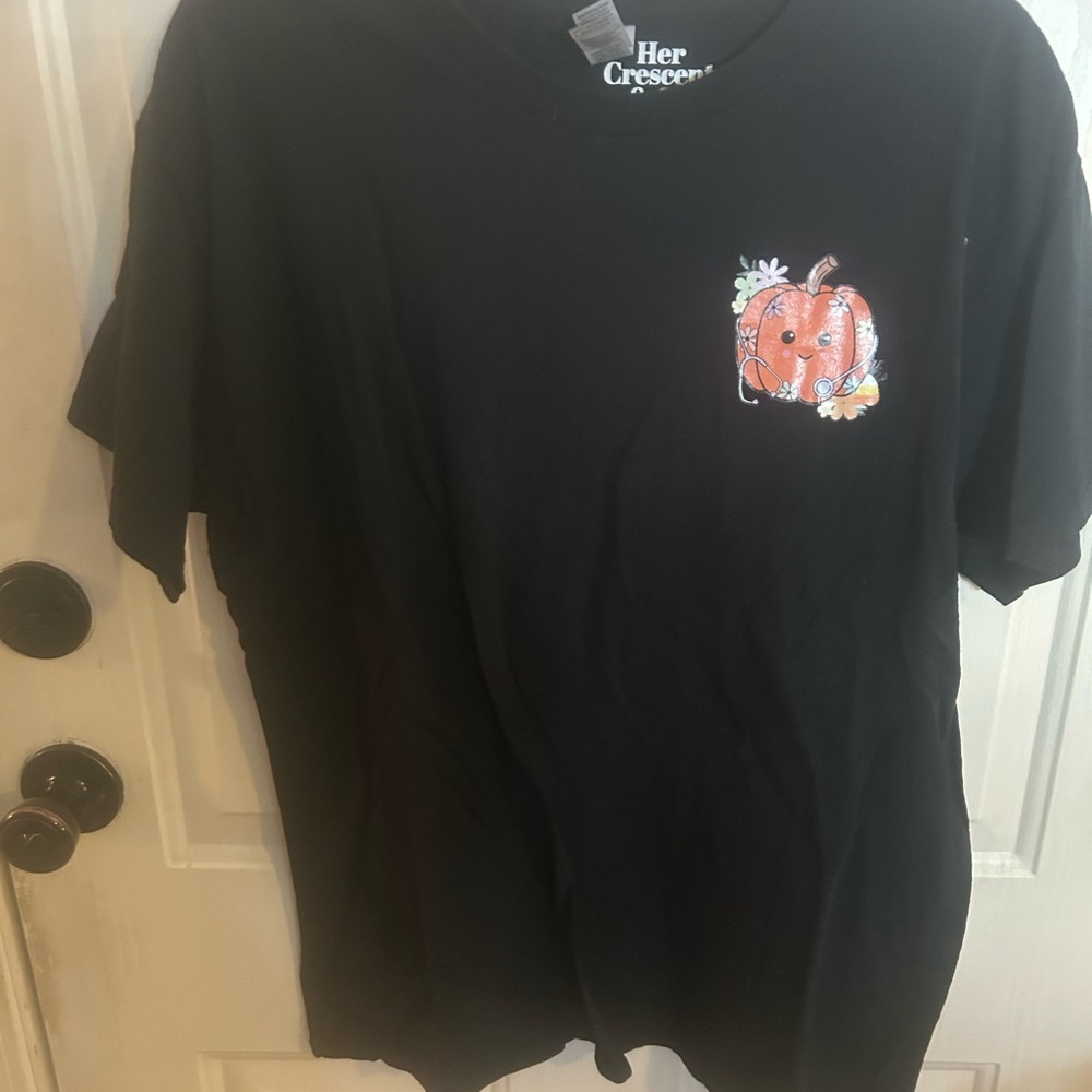 Crescent Black Short Sleeve Tee with Orange Pumpkin Chest Motif